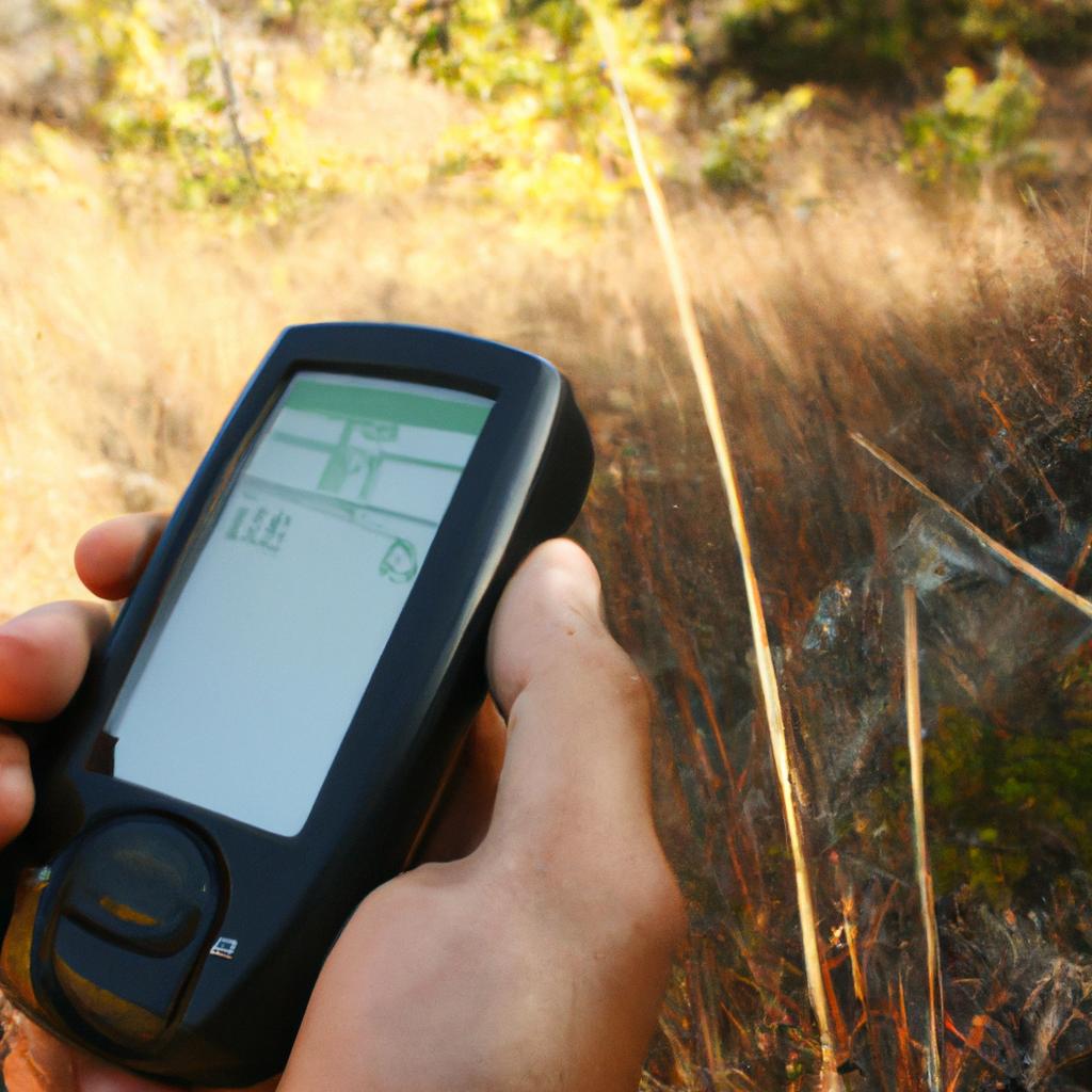 Person using GPS in wilderness