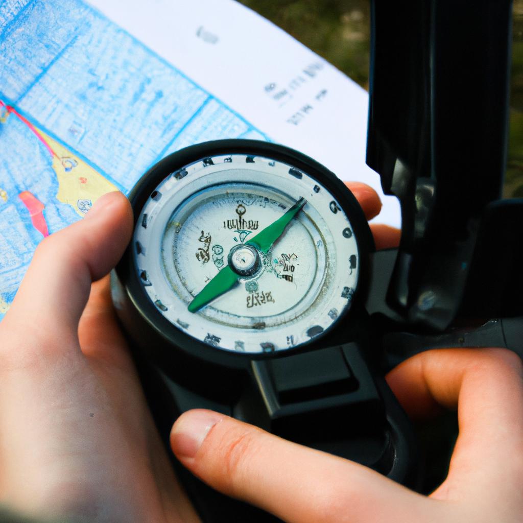 Person using compass and map